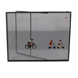   Áttetsző retro diavetítő kép fém keretben. Biciklizve...