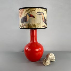   Italian design large ceramic table lamp in a red–coral shade