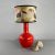 Italian design large ceramic table lamp in a red–coral shade