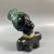 Mid-century African-American female head with turquoise hair by Margit Izsépy 