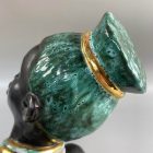 Mid-century African-American female head with turquoise hair by Margit Izsépy 