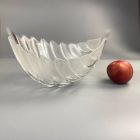 Retro fruit bowl with palm leaves